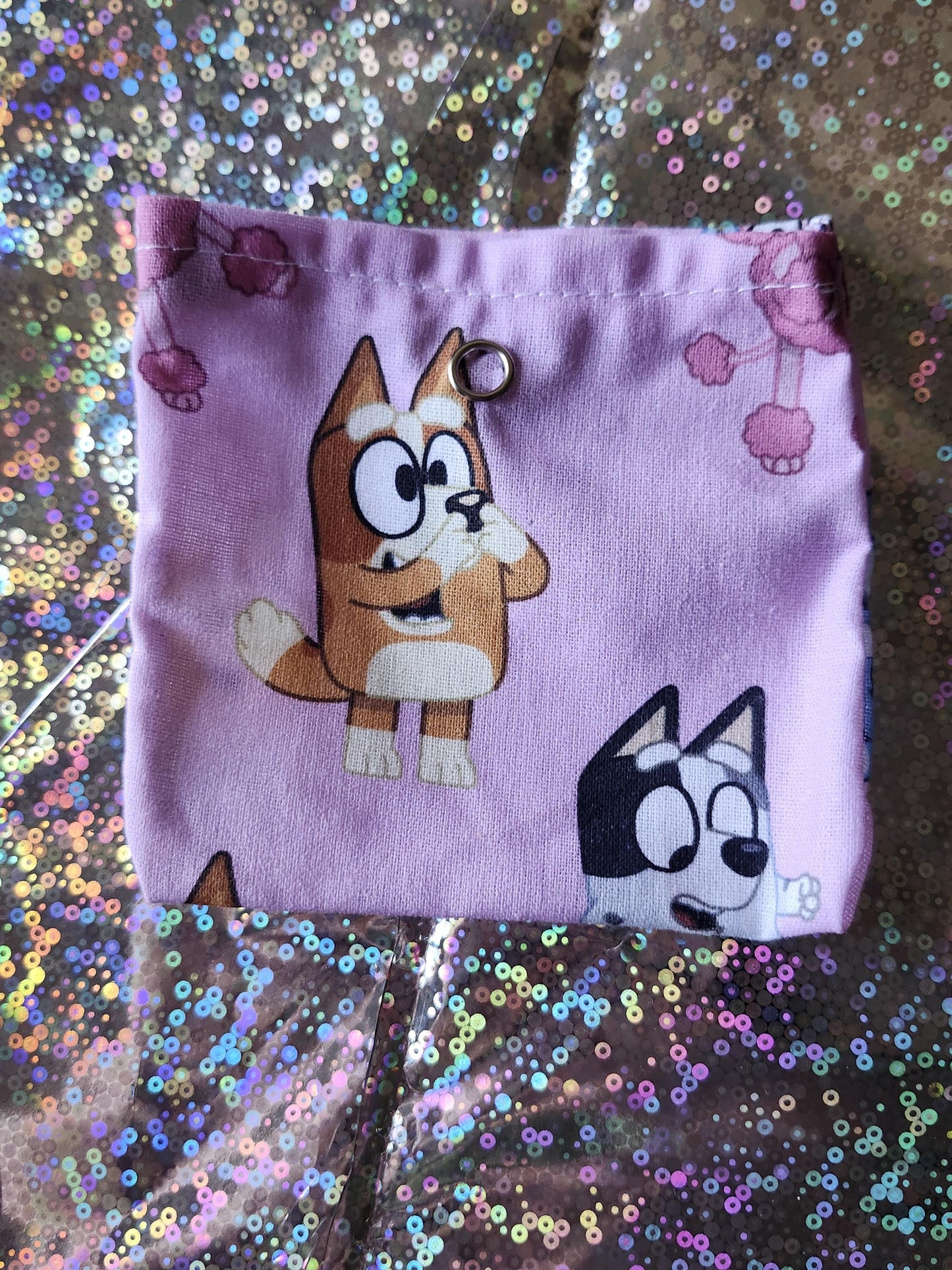 Cute Bluey trinket pouch gift featuring character designs on a lilac background