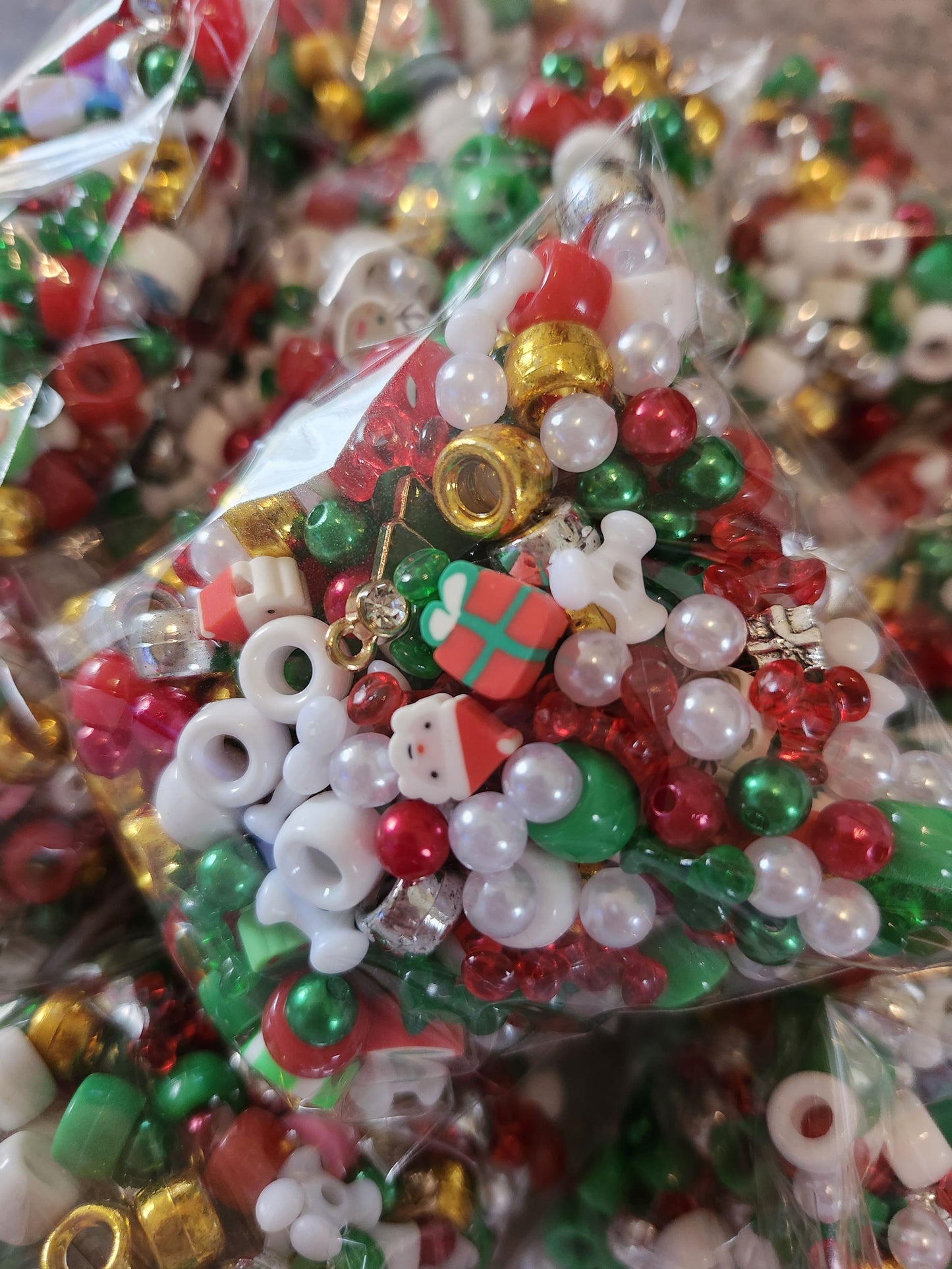 Colorful Christmas bead mix with red, green, and gold beads perfect for holiday crafts and decorations