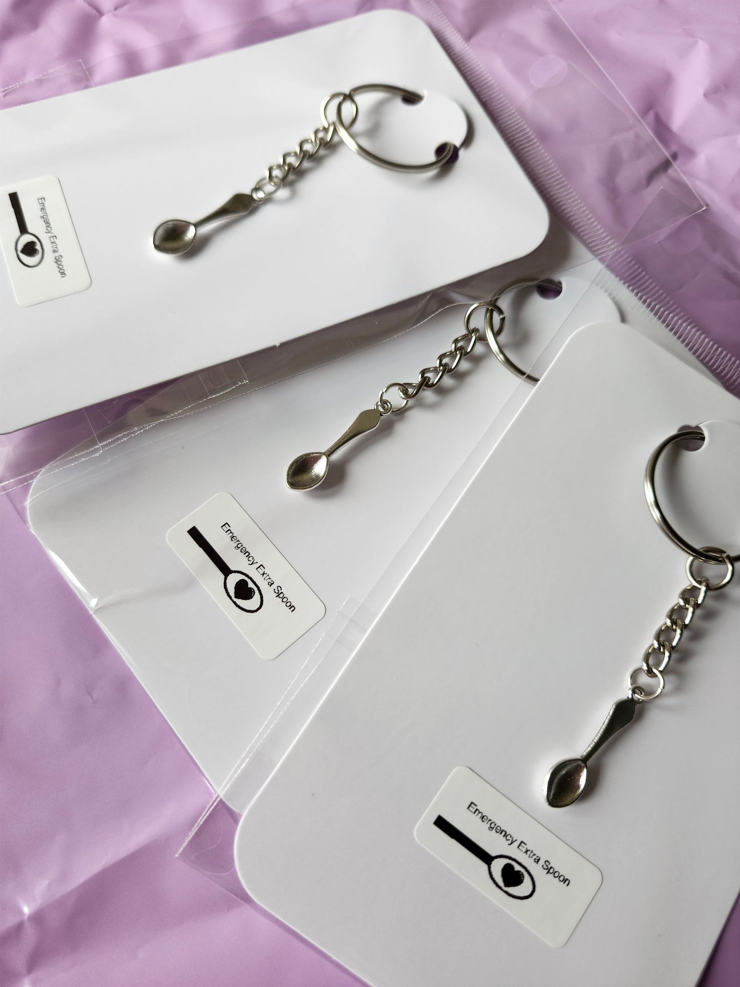 Chronic illness spoonie keychain with silver spoon charm on a stylish keyring for daily reminders