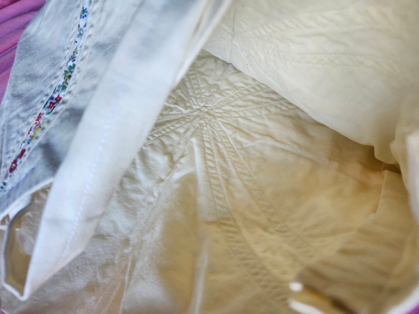 Inside view of a handmade floral tote bag with a spacious and neatly stitched interior