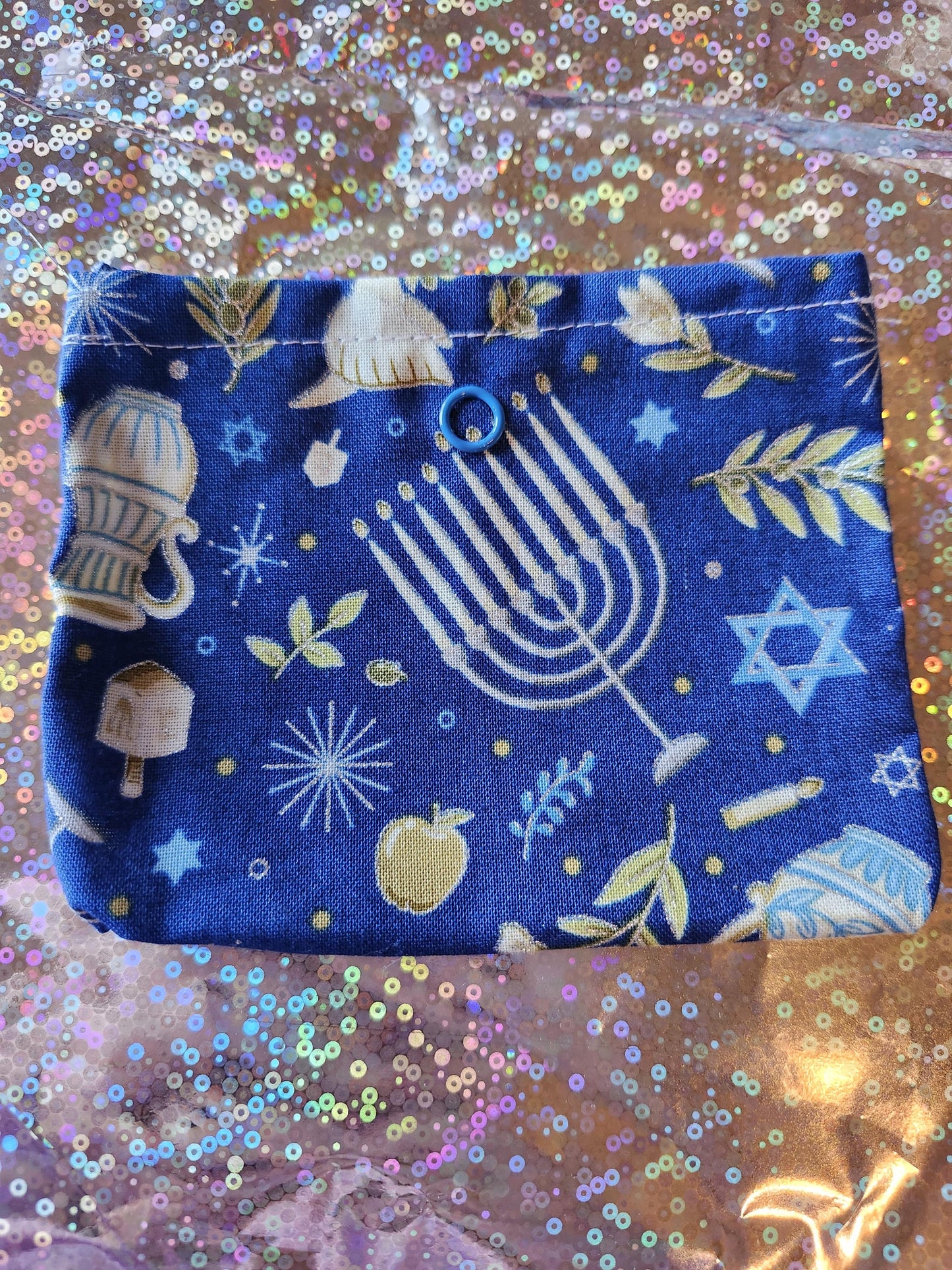 Colorful Handmade Hanukkah gift pouch with festive designs, ideal for holiday celebrations