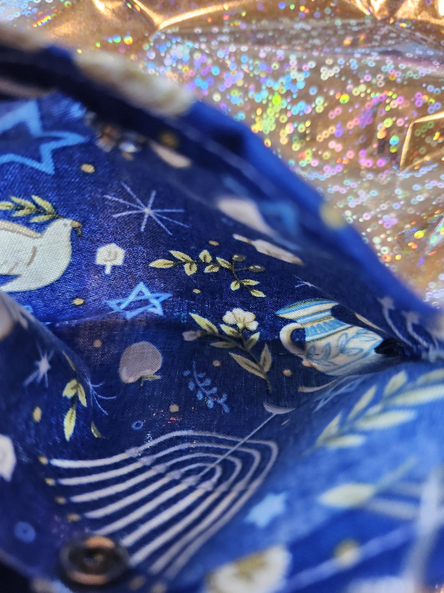Interior view of handmade Hanukkah gift pouch with floral and starry design details