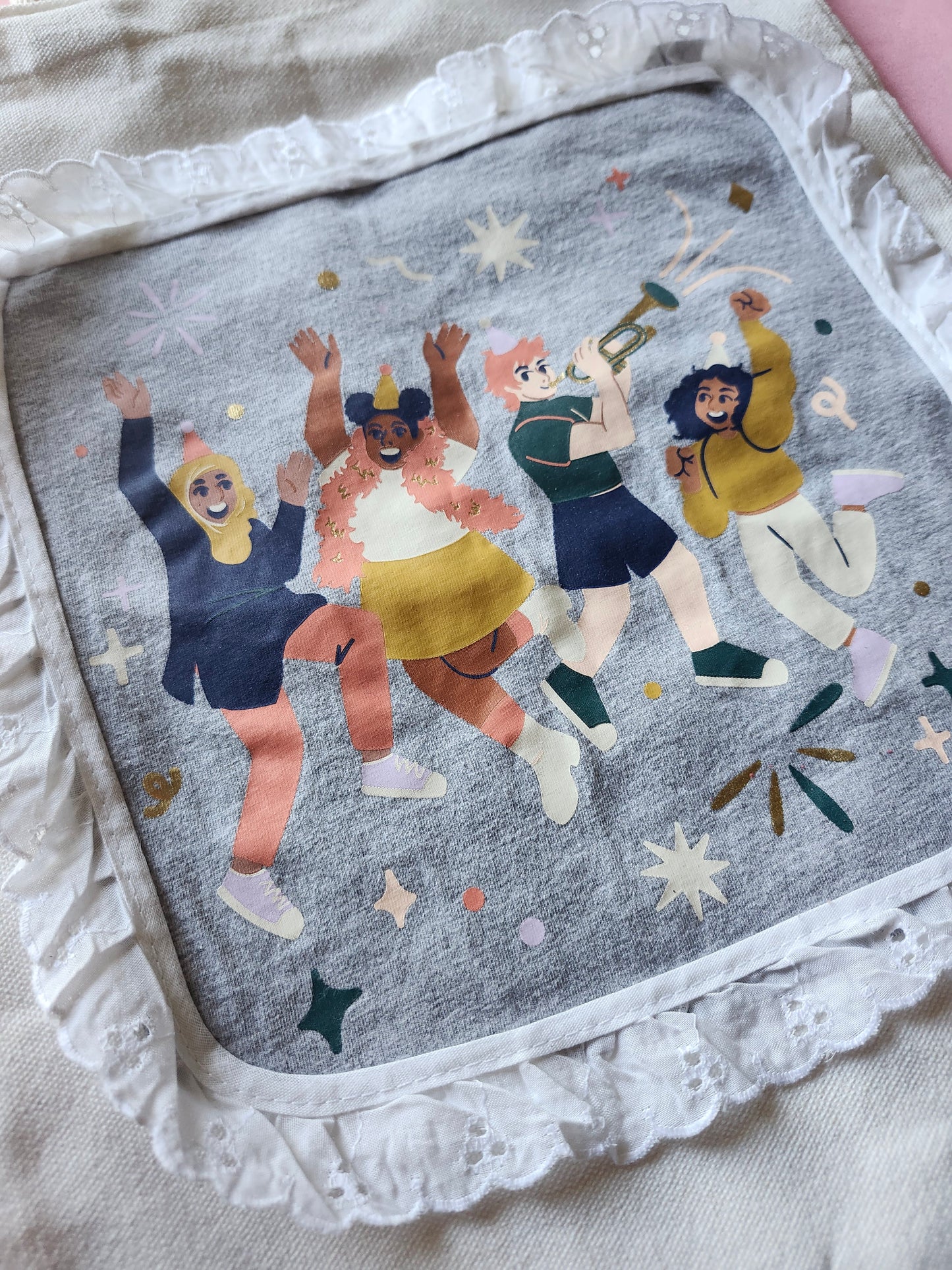 Colorful inclusive design tote bag featuring joyful diverse characters celebrating together