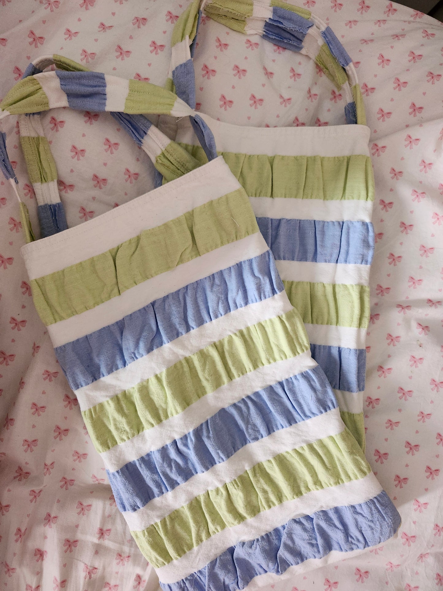Two upcycled summer tote bags in green and blue stripes, perfect for beach trips and eco-friendly outings