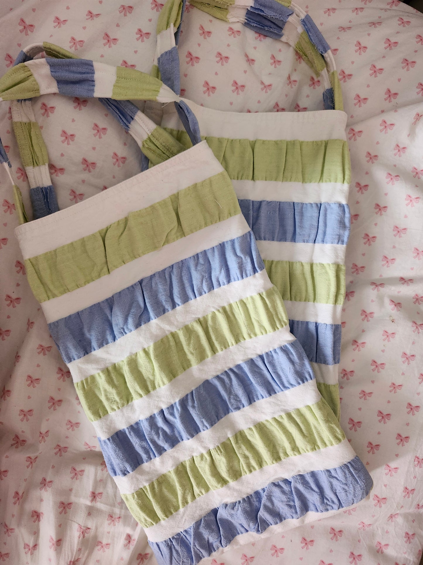 Two upcycled summer tote bags in blue and green stripes, perfect for eco-friendly errands