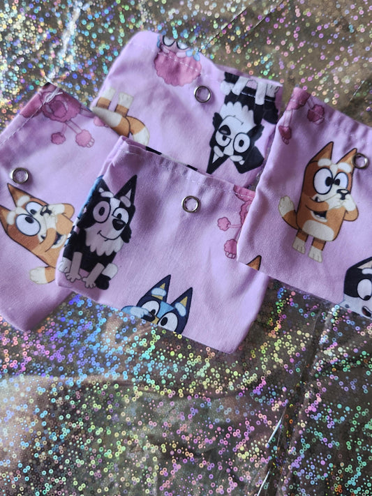 Set of colorful Bluey trinket pouches featuring playful designs, perfect gift for fans