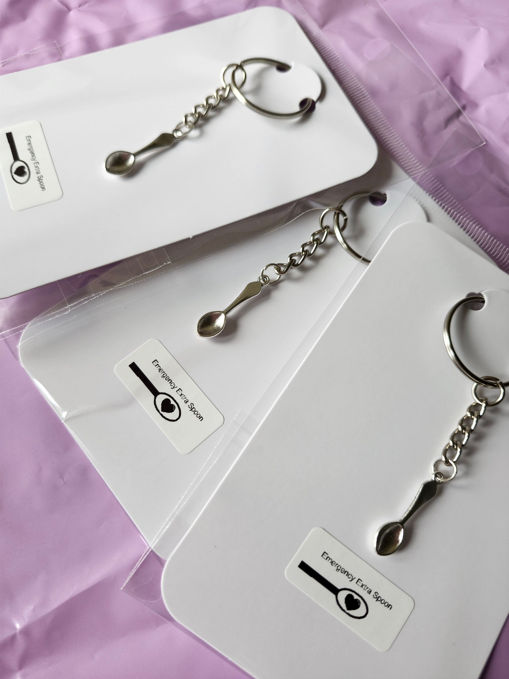 Chronic illness spoonie keychain with silver spoon charm on a stylish keyring for daily reminders