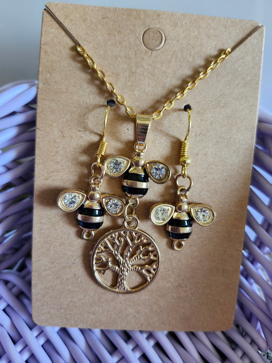 Golden Honey Bee Jewelry Set featuring earrings and pendant with bee design and tree of life charm