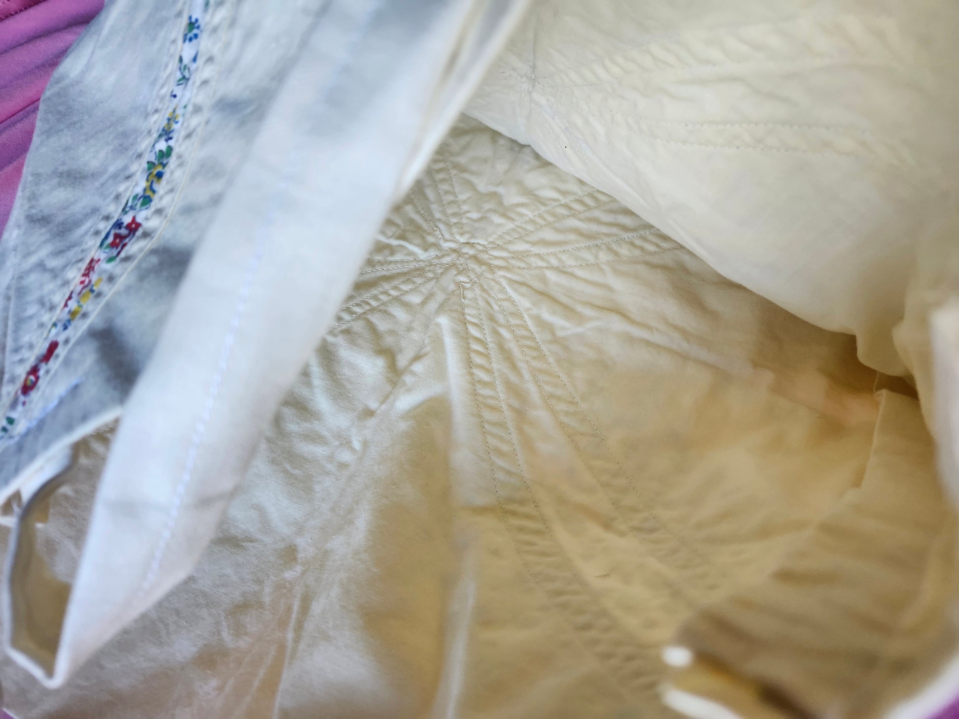 Inside view of a handmade floral tote bag with a spacious and neatly stitched interior