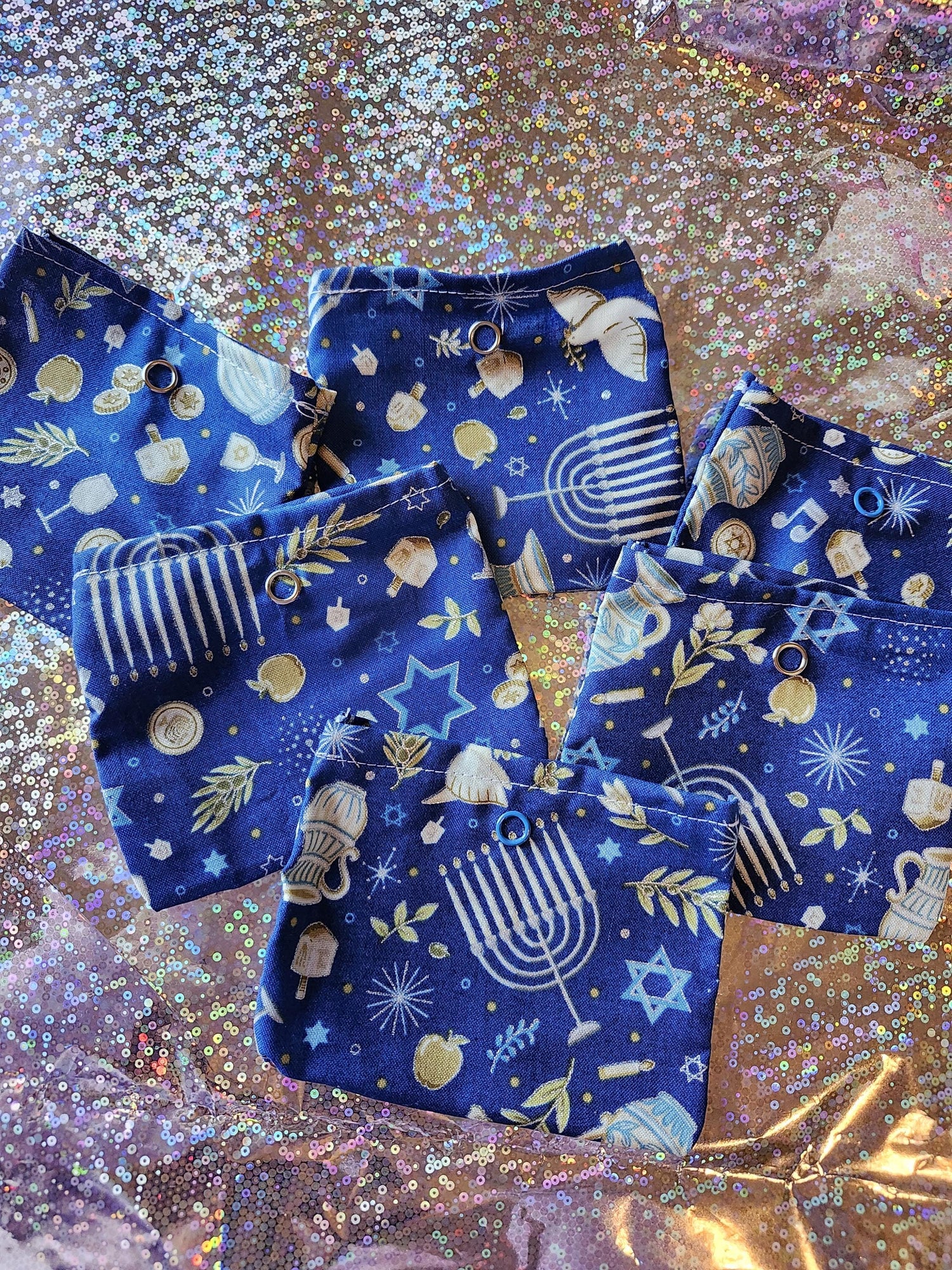 Set of five Handmade Hanukkah gift pouch in festive blue design with menorahs and dreidels