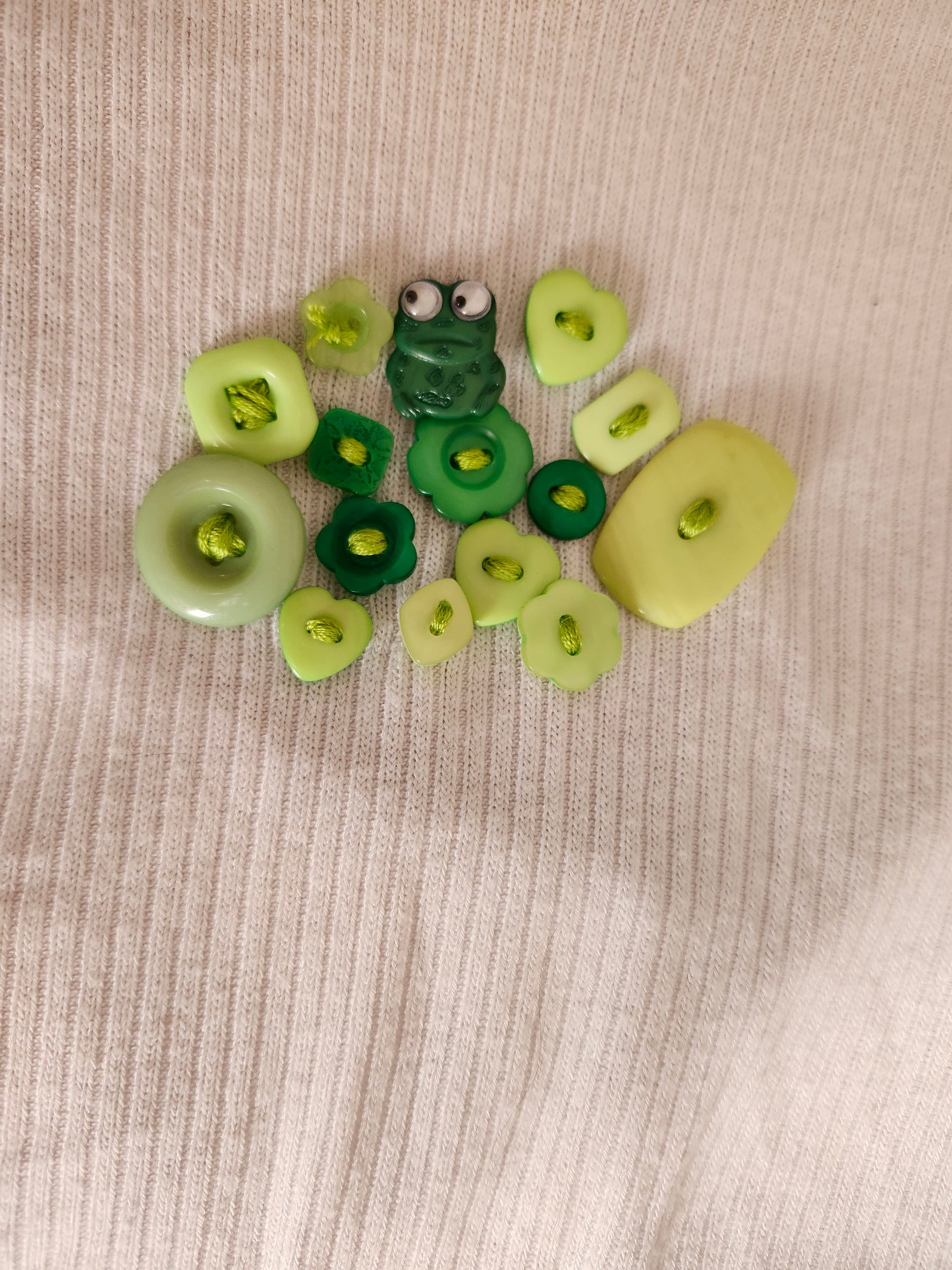 Handsewn embroidered frog shirt featuring a playful green frog and colorful buttons