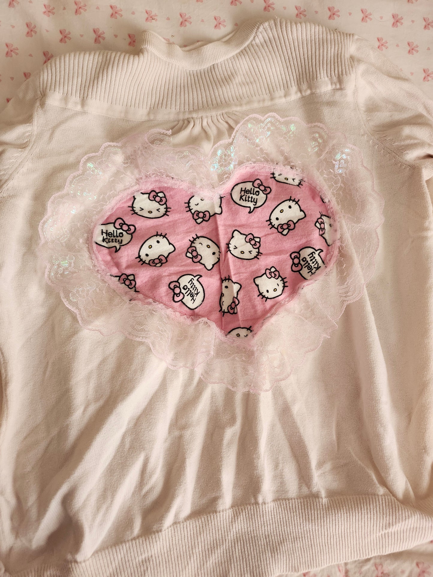 Hello Kitty pink cardigan XL with heart-shaped design featuring cute Hello Kitty prints