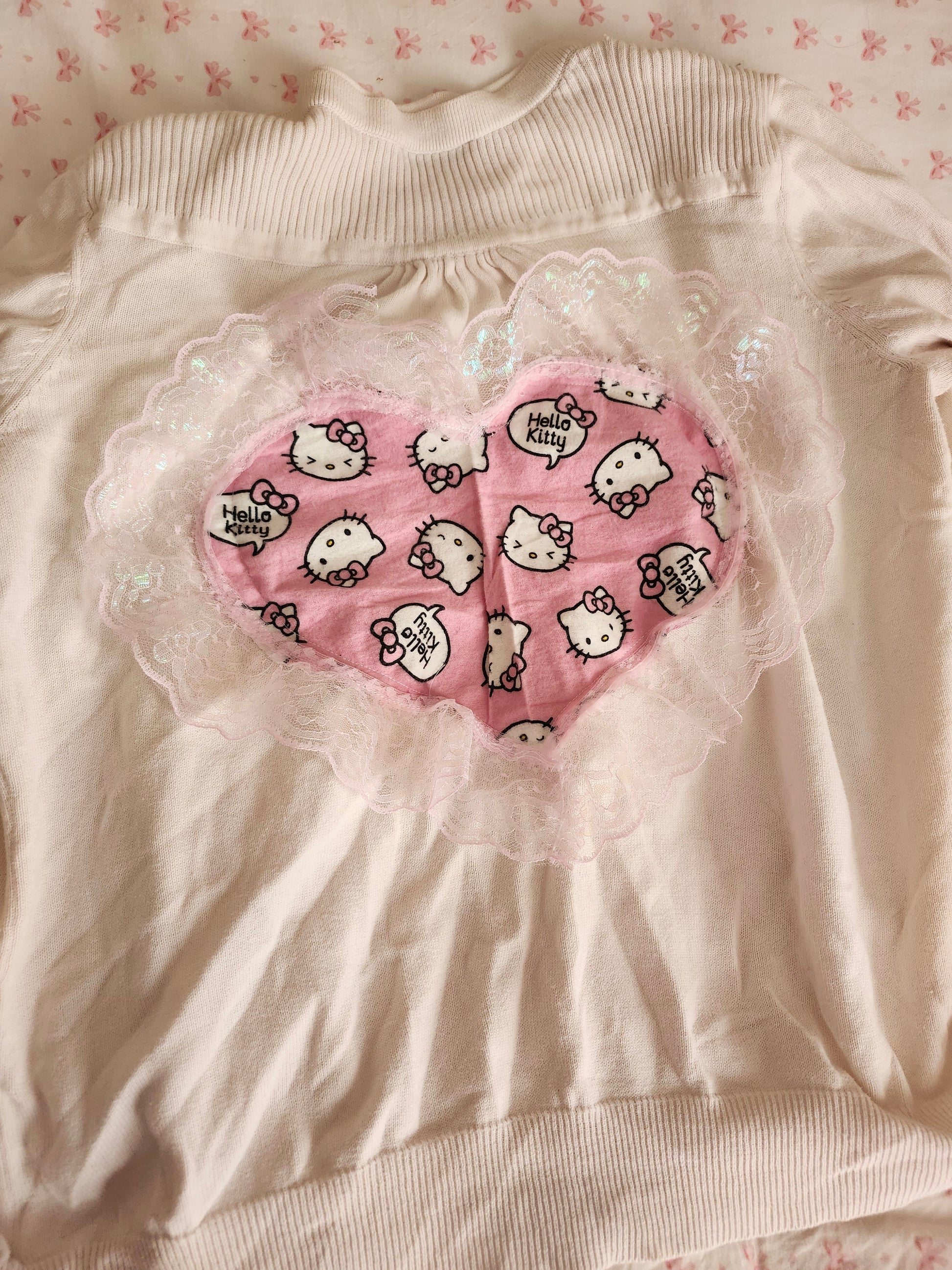 Hello Kitty pink cardigan XL with heart-shaped design featuring cute Hello Kitty prints