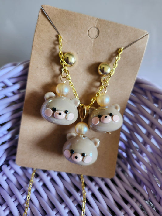 Kawaii bear necklace set featuring three adorable bear charms with pearls and gold accents