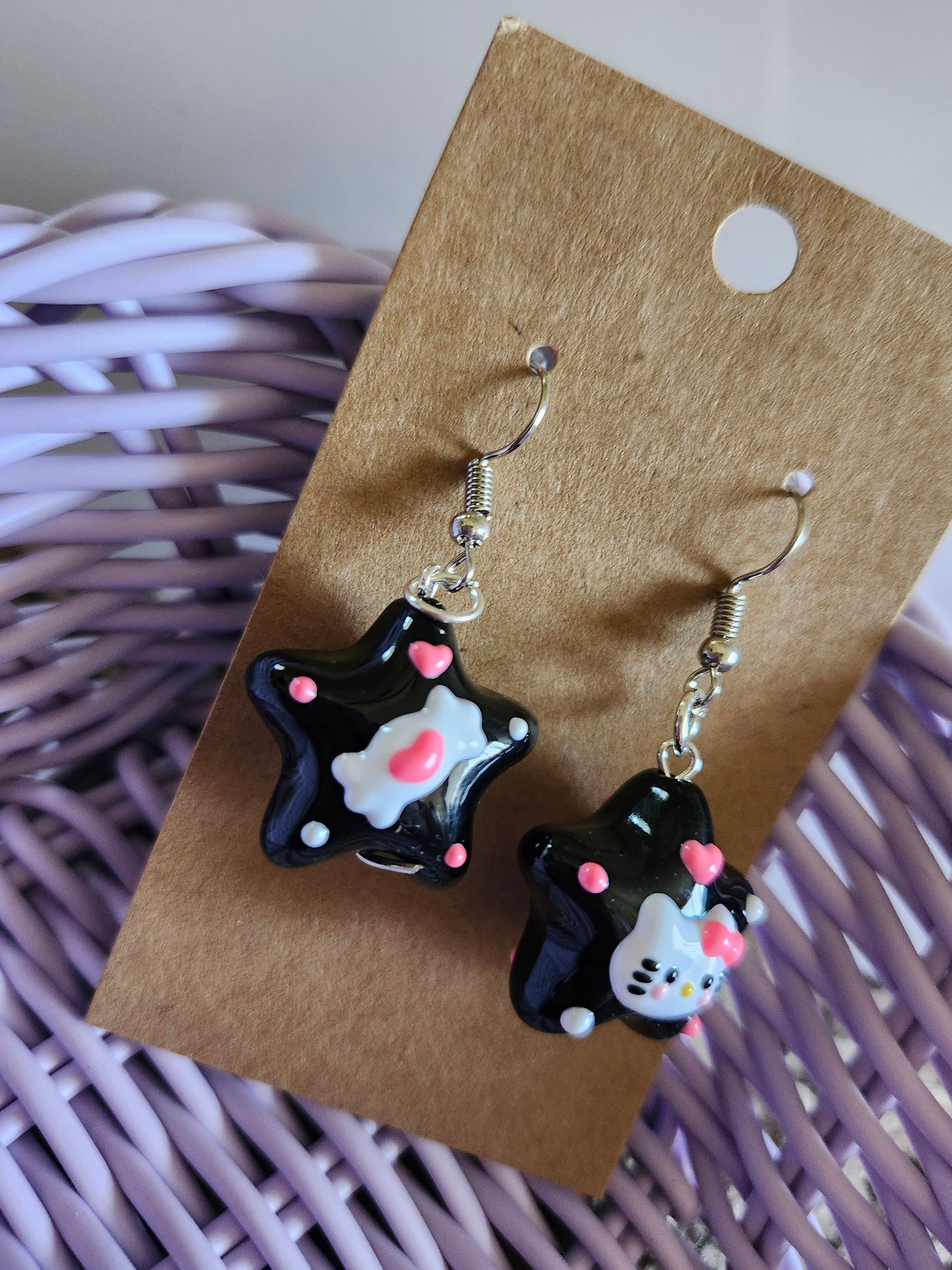 Kawaii Hello Kitty earrings featuring star-shaped charms and colorful details for cute accessories