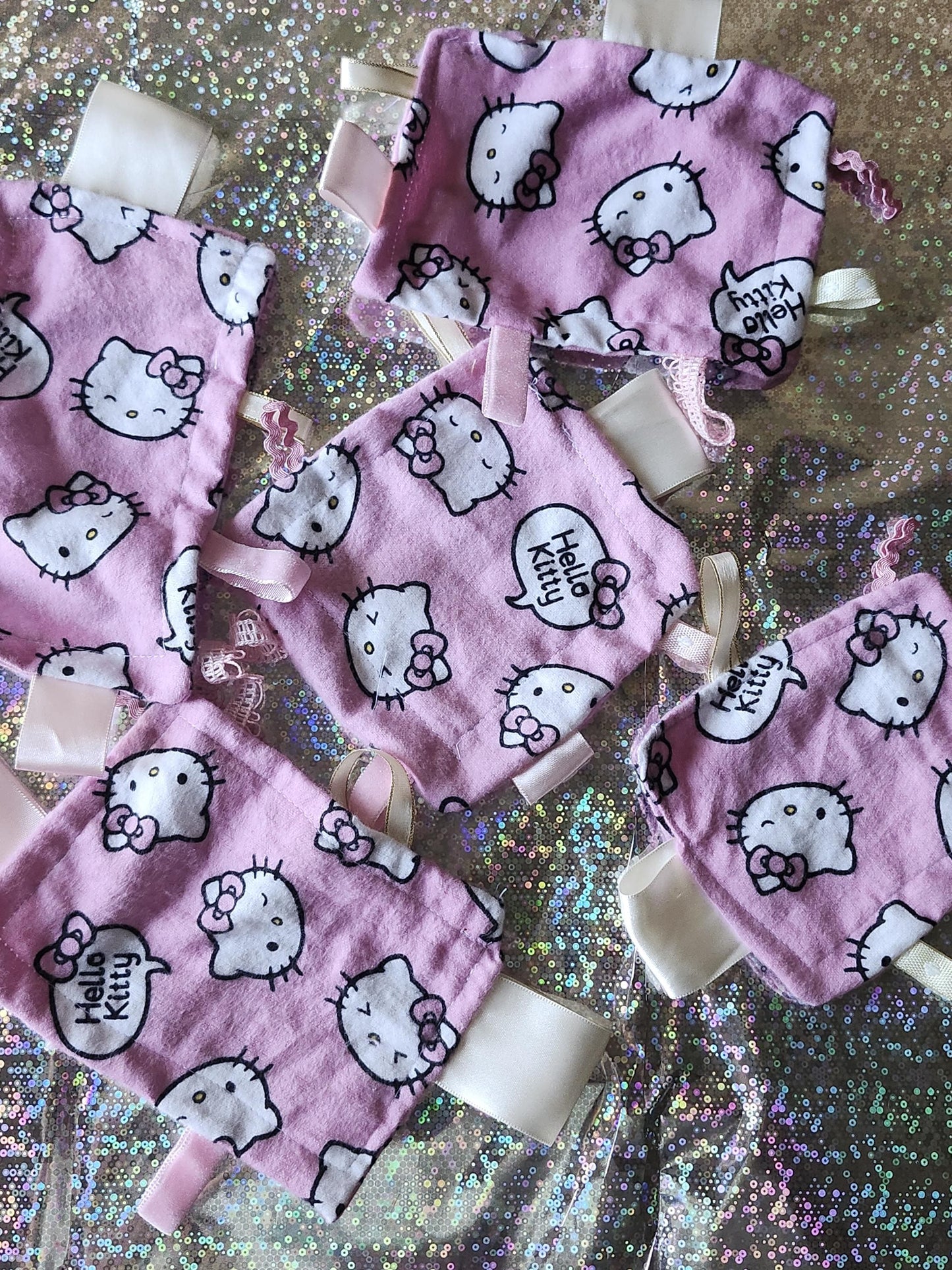 Kawaii Hello Kitty fidget toy set with soft fabric and multiple tags for sensory play