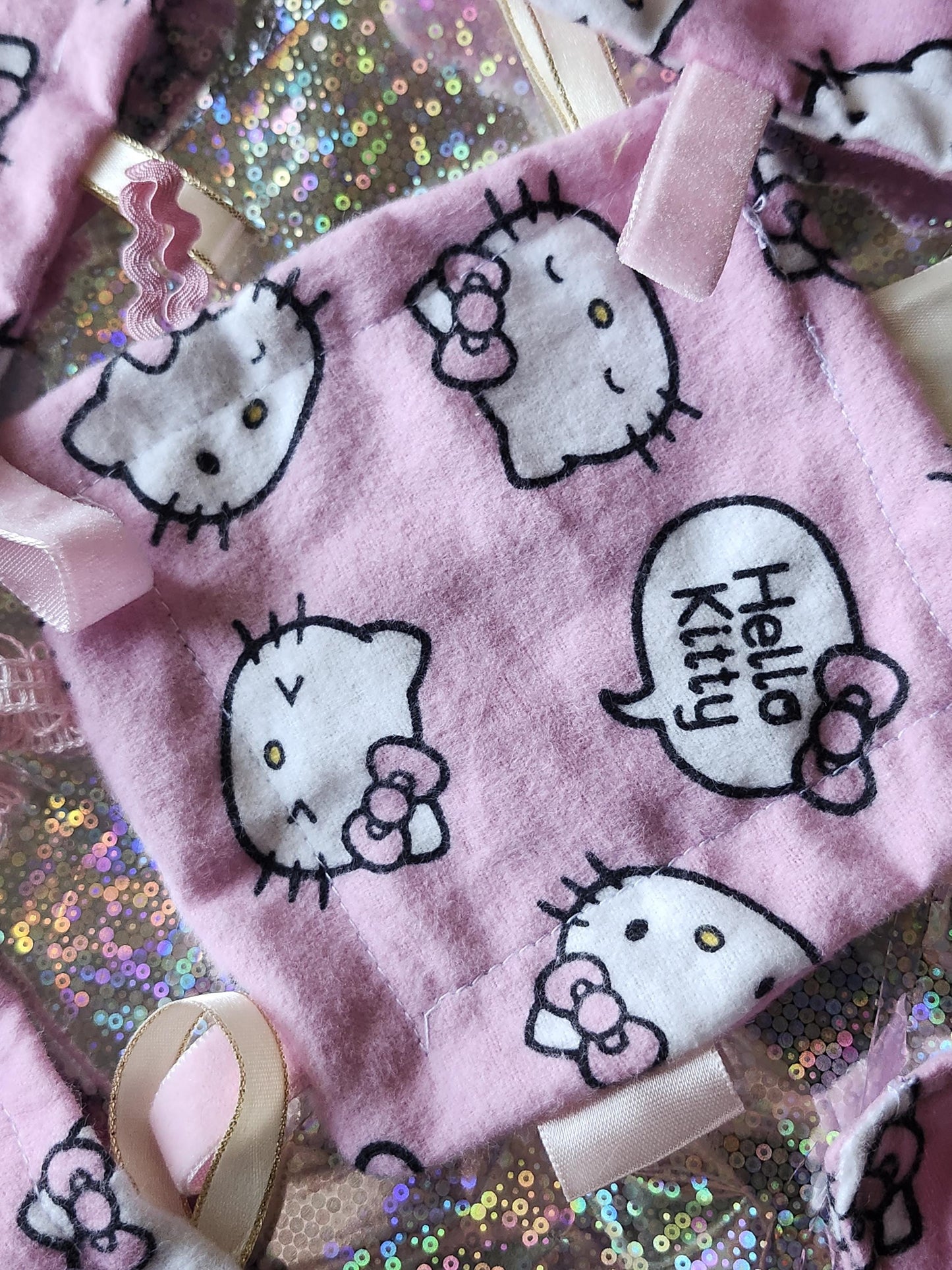 Kawaii Hello Kitty fidget toy featuring soft fabric with cute Hello Kitty prints and textured tags