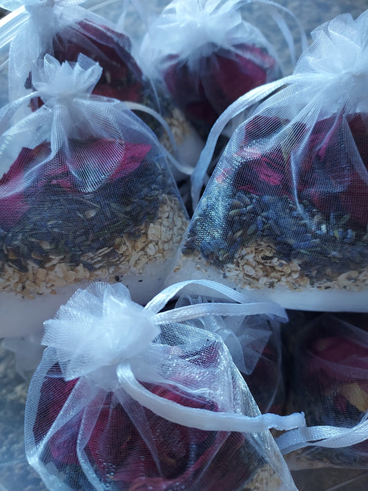 Natural spa bath blend sachets filled with dried flowers, oats, and lavender for a soothing bath experience