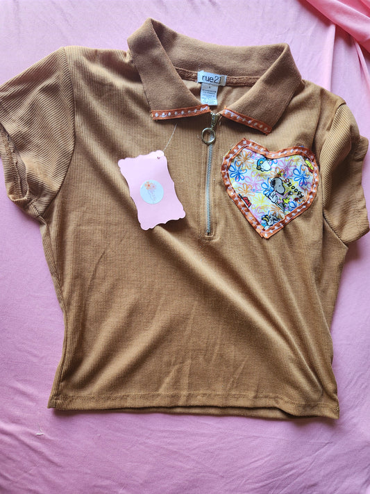 Snoopy heart crop top in brown with floral heart design and zip detail for a trendy look