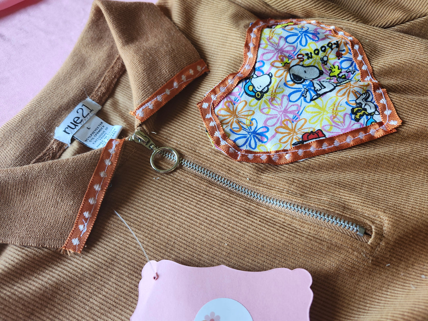 Snoopy heart crop top in brown with colorful heart patch featuring Snoopy and flowers