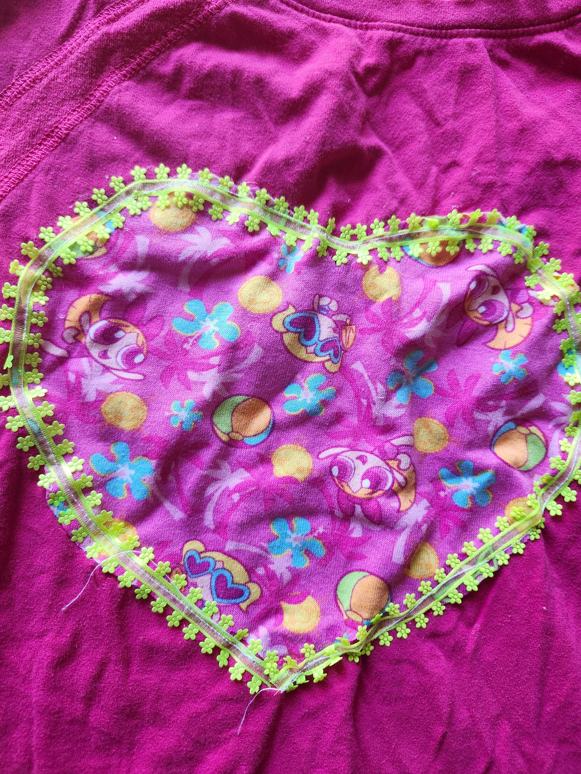 Y2K Power Puff Girls Heart Patch with Colorful Floral Patterns on a Pink Background